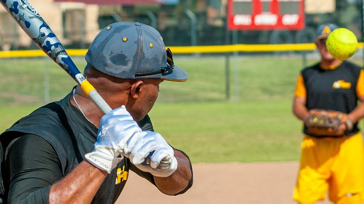 Softball player about to take a swing